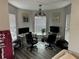 Bright office space with dual desks, modern lighting, and large windows for ample natural light at 5427 Hansel Ave # 9, Orlando, FL 32809