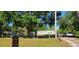 Exterior view of home, yard, and driveway at 6222 Dovecrest Trl, Lakeland, FL 33810