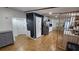 Hallway view into an open kitchen, dining, and living area with stainless steel appliances at 6222 Dovecrest Trl, Lakeland, FL 33810