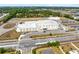 Aerial view of school including play ground, running track, sports fields, and parking at 640 Brookfield Pl, Apopka, FL 32712