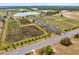 Aerial view of park featuring baseball diamonds, parking and green trees at 640 Brookfield Pl, Apopka, FL 32712