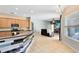 Bright kitchen with a breakfast bar overlooking the living room at 640 Brookfield Pl, Apopka, FL 32712