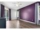 Spacious main bedroom with laminate flooring and sliding doors to the patio at 640 Brookfield Pl, Apopka, FL 32712