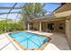 Backyard oasis features a refreshing pool and screened-in lanai for outdoor enjoyment at 640 Brookfield Pl, Apopka, FL 32712