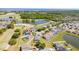 Expansive aerial shot of homes located on golf course and lakes, showcasing premium, scenic community at 654 Chadbury Way, Kissimmee, FL 34744