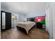Bright bedroom with natural light features a view of the yard from the window at 654 Chadbury Way, Kissimmee, FL 34744