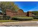A brick sign for the Remington community amidst lush greenery, suggesting a well-maintained neighborhood at 654 Chadbury Way, Kissimmee, FL 34744
