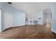 Spacious living room with a wood-look floor and bright light at 654 Chadbury Way, Kissimmee, FL 34744