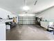 Spacious two-car garage with ample storage space for vehicles and belongings at 6559 Grosvenor Ln, Orlando, FL 32835