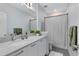 This bathroom offers a sleek vanity with quartz countertop and modern finishes at 6665 Bridgman St, Orlando, FL 32827
