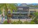 Eye-level, wide shot of the entry to LP Fit gym in a business plaza with manicured landscaping at 6665 Bridgman St, Orlando, FL 32827
