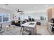 This living room features a modern kitchen, a large window, and recessed lighting at 6665 Bridgman St, Orlando, FL 32827
