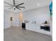 Spacious living area with wet bar, wine cooler, and modern appliances at 6665 Bridgman St, Orlando, FL 32827