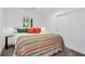 Cozy bedroom with a decorative blanket and window, with plenty of natural light at 7455 Sparkling Lake Rd, Orlando, FL 32819