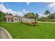 Welcome to Orange Tree, a community featuring beautiful landscaping and a charming entrance at 7455 Sparkling Lake Rd, Orlando, FL 32819