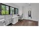 Home office area featuring modern decor, ample storage, and natural light at 7455 Sparkling Lake Rd, Orlando, FL 32819