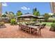 Outdoor patio area, including a dining area and lounge chairs for relaxation at 7455 Sparkling Lake Rd, Orlando, FL 32819