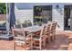 Outdoor patio featuring a dining area and lounge area, perfect for entertaining guests at 7455 Sparkling Lake Rd, Orlando, FL 32819