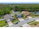 Aerial view of the home showing backyard, pond, and neighborhood at 820 Timber Isle Dr, Orlando, FL 32828