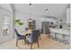 Cozy dining area with modern light fixture, rug and tile floors at 820 Timber Isle Dr, Orlando, FL 32828