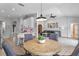 Open concept kitchen and living room with hardwood floors and lots of natural light at 820 Timber Isle Dr, Orlando, FL 32828