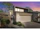 Charming condo with a two-car garage, lush landscaping, and modern architectural details at 85 Carolwood Blvd, Fern Park, FL 32730