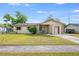 Charming single-story home with well-maintained lawn and front door at 870 Darwin Dr, Altamonte Springs, FL 32701