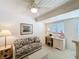 Cozy bedroom features carpet, desk and daybed, creating a perfect space for relaxation and productivity at 1 Huntley Ct, Haines City, FL 33844