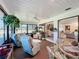 Relaxing screened lanai with comfortable seating and views of the backyard at 1 Huntley Ct, Haines City, FL 33844