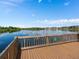 Community dock offering lake views and a space to enjoy waterfront activities at 10765 Village Lake Rd, Windermere, FL 34786