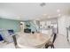 Open concept floor plan features a kitchen, dining area and living room at 11279 Amber Ridge Dr, Zellwood, FL 32798