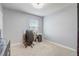 Clean and bright office space with plenty of natural light and neutral walls and carpet at 11279 Amber Ridge Dr, Zellwood, FL 32798