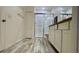 Bathroom features a glass enclosed shower, white cabinets and granite countertop at 118 Hurst Ct, Deland, FL 32724
