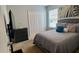 Bedroom featuring neutral wall color, carpeted floor, and a gray bed set at 118 Hurst Ct, Deland, FL 32724