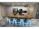Kitchen island with granite countertops, a sink, and seating for four at 118 Hurst Ct, Deland, FL 32724