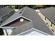Aerial detail of roof on single Gathering home, featuring newer shingles and ventilation at 118 Hurst Ct, Deland, FL 32724