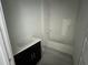 A bright bathroom showcasing a white subway tile shower and a dark vanity with a white countertop at 13528 Autumn Harvest Ave, Winter Garden, FL 34787