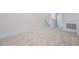 Comfortable bedroom with neutral carpet, clean white walls, and ample space at 13528 Autumn Harvest Ave, Winter Garden, FL 34787