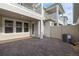Private outdoor brick-paved patio perfect for relaxation and entertainment at 13528 Autumn Harvest Ave, Winter Garden, FL 34787