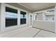 Covered patio showing neutral color palette and plenty of sunshine at 13528 Autumn Harvest Ave, Winter Garden, FL 34787