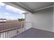 This balcony features a painted ceiling, vinyl siding and railing, with ample space for outdoor furniture at 13536 Autumn Harvest Ave, Winter Garden, FL 34787