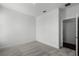 This is a carpeted bedroom with white walls, white trim, and a modern ceiling vent at 13536 Autumn Harvest Ave, Winter Garden, FL 34787