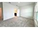 Bright bedroom with carpet and ensuite bathroom at 13536 Autumn Harvest Ave, Winter Garden, FL 34787
