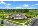 A clubhouse with well manicured landscaping, situated in a vibrant community at 13536 Autumn Harvest Ave, Winter Garden, FL 34787