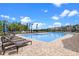 Resort-style community pool with lounge chairs and umbrellas, providing a relaxing oasis for residents at 13536 Autumn Harvest Ave, Winter Garden, FL 34787