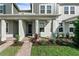 Charming front porch with brick pathway and landscaped garden at 13536 Autumn Harvest Ave, Winter Garden, FL 34787