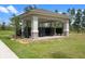 Community mailbox under pavilion and lush green grass at 13536 Autumn Harvest Ave, Winter Garden, FL 34787