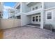 Private outdoor patio with brick pavers and a privacy fence at 13536 Autumn Harvest Ave, Winter Garden, FL 34787