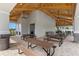 View of the pavilion featuring picnic tables, an outdoor cooking space, and a covered seating area for residents' enjoyment at 13536 Autumn Harvest Ave, Winter Garden, FL 34787