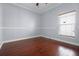 Empty bedroom with natural light and wood floors at 13722 Fox Glove St, Winter Garden, FL 34787